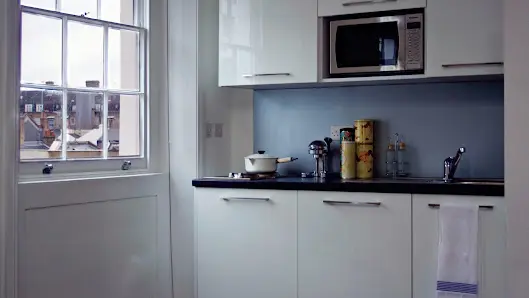 JOHN STRAND KITCHENS & WALL BEDS – Showroom visits by appointment only